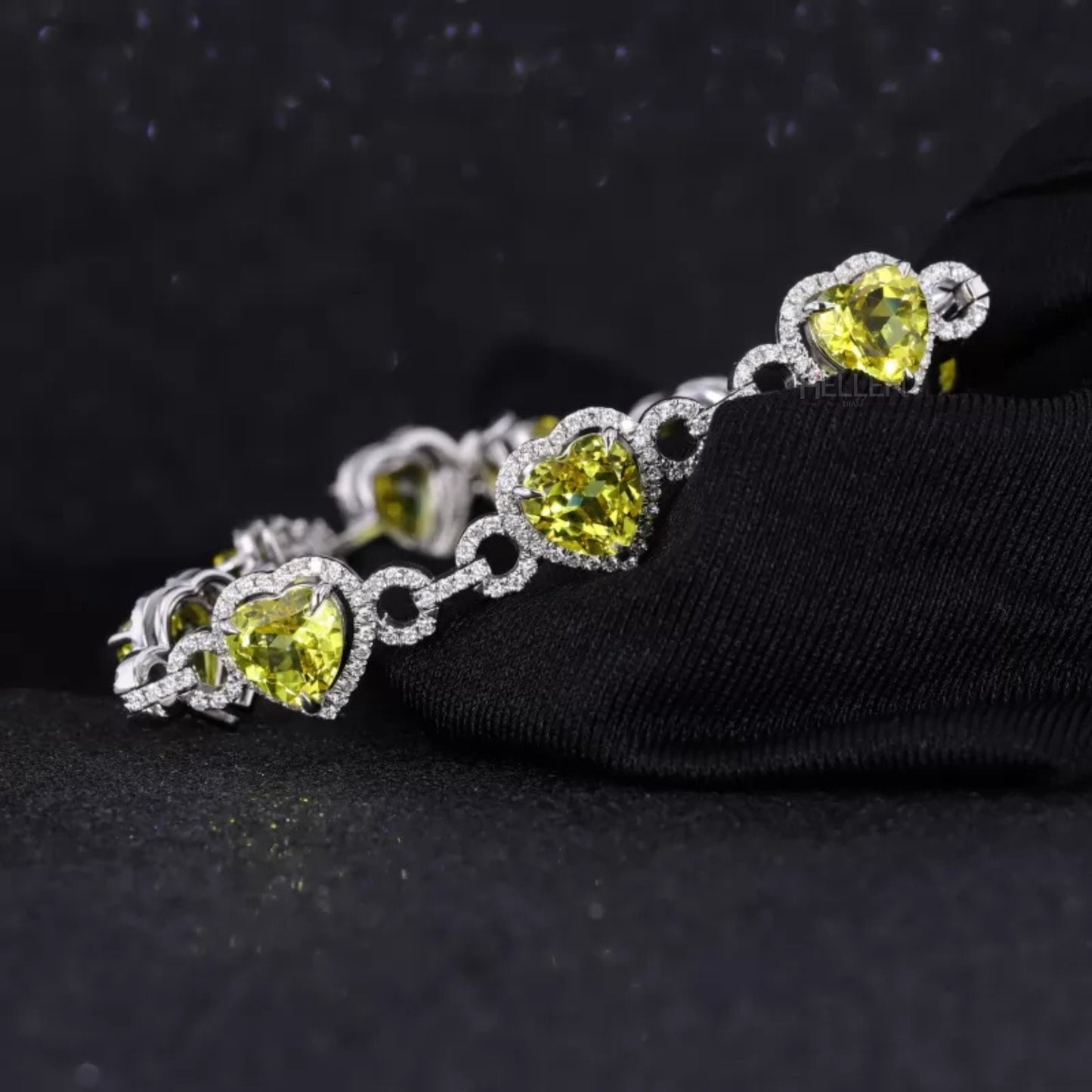 Linking bracelet with heart cut yellow gemstone and moissanite accents – playful and romantic wristwear