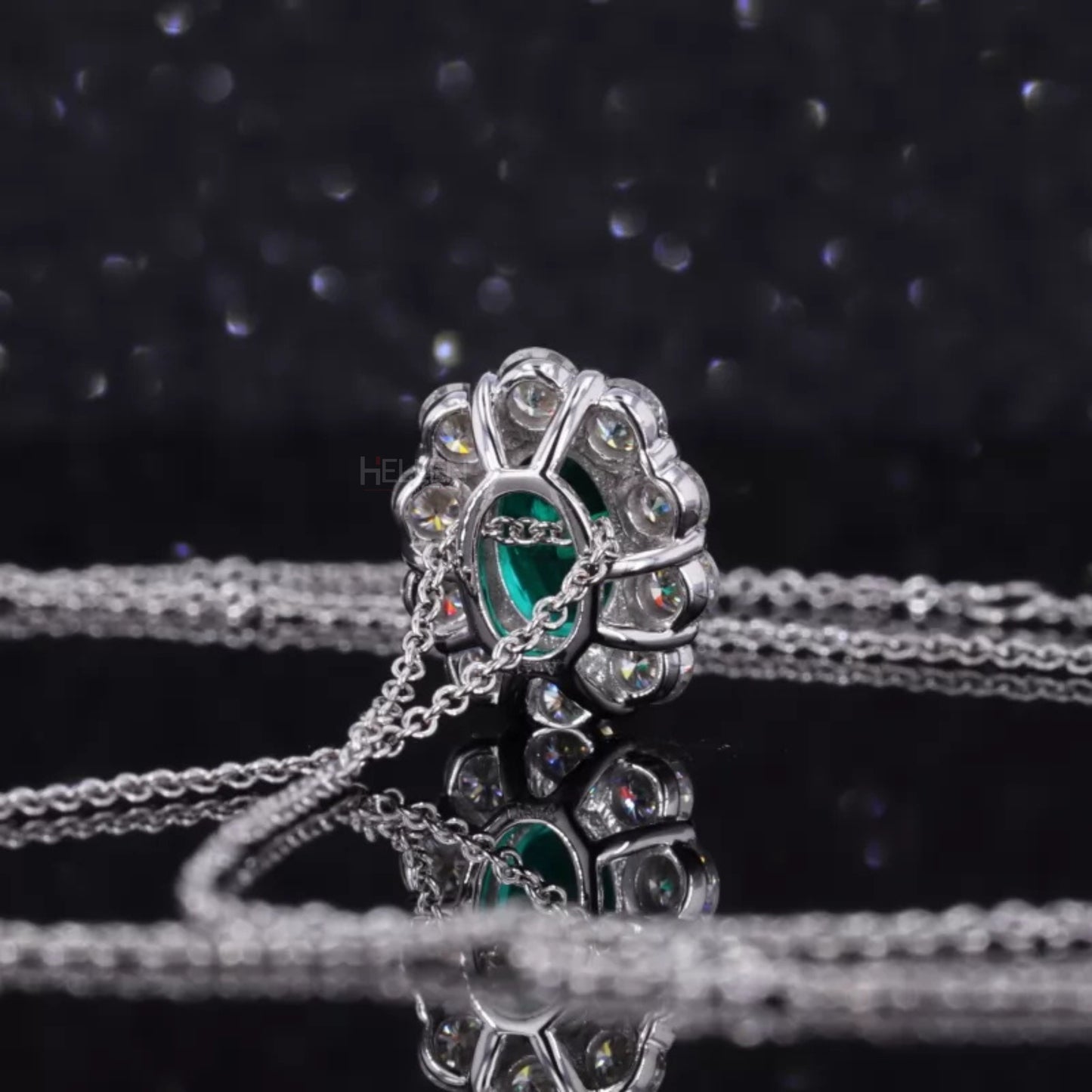 Iconic Oval Emerald Halo Necklace with Round Moissanite