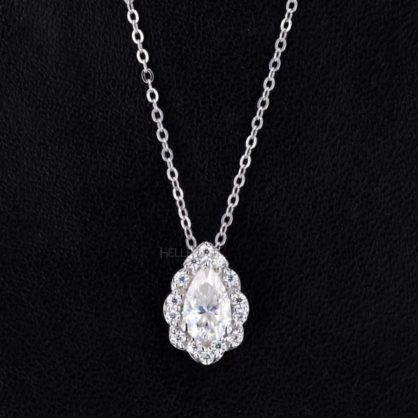Pear cut moissanite halo necklace with hidden loop – teardrop brilliance in a seamless drop design
