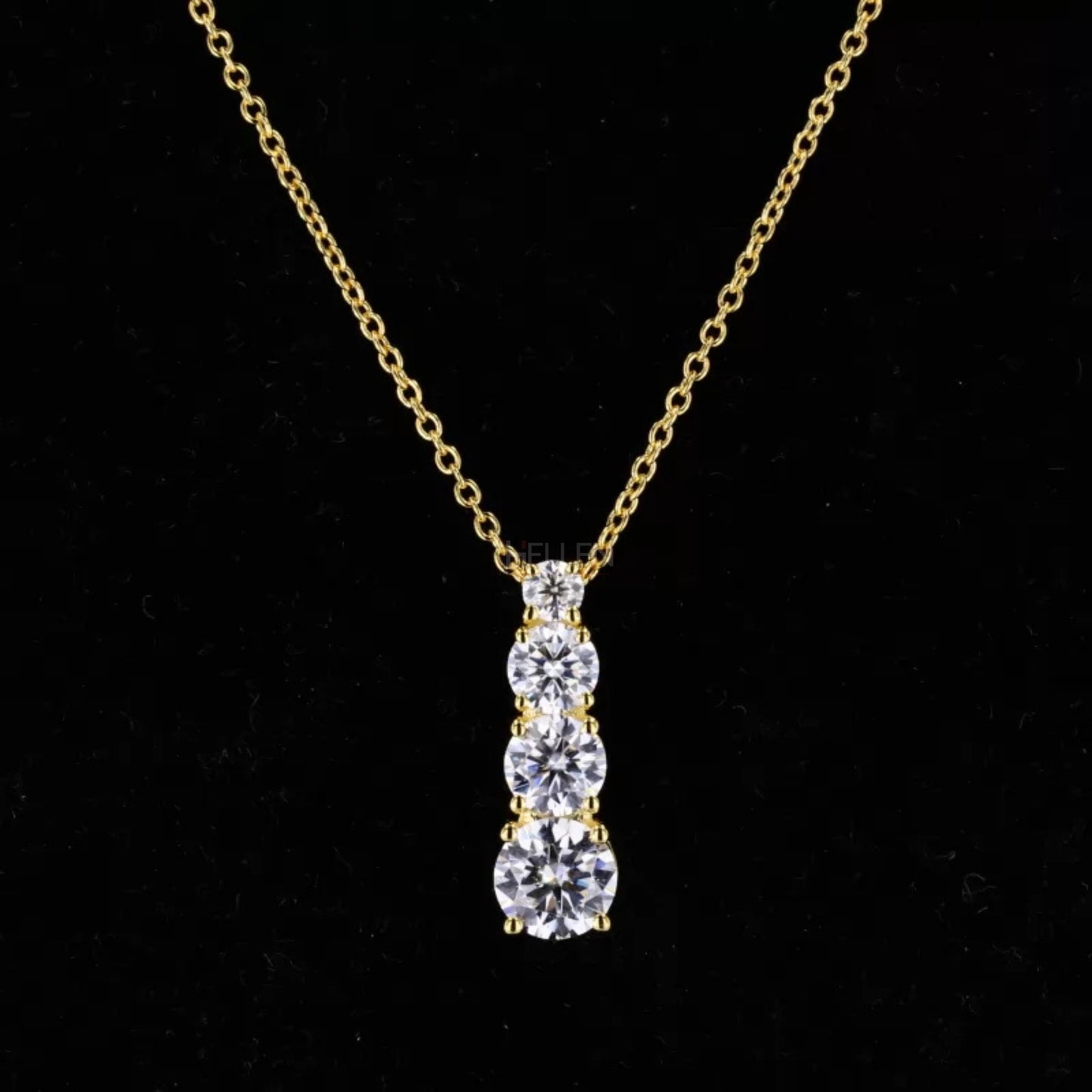 Long pendant necklace with small round cut moissanite in ascending line – elegant and minimalist vertical design