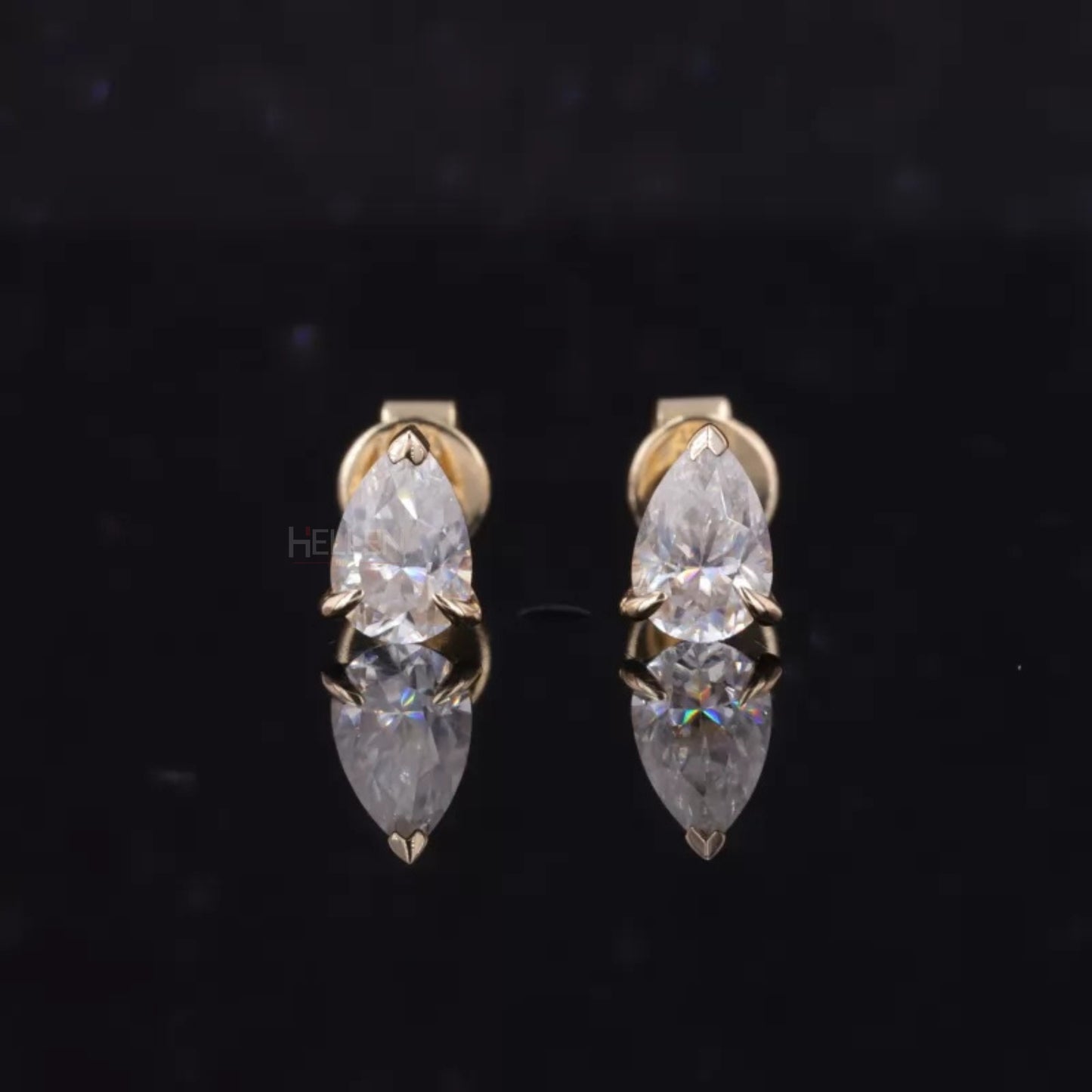 Luxury sterling silver studs with pear cut moissanite – elegant teardrop shape for refined style