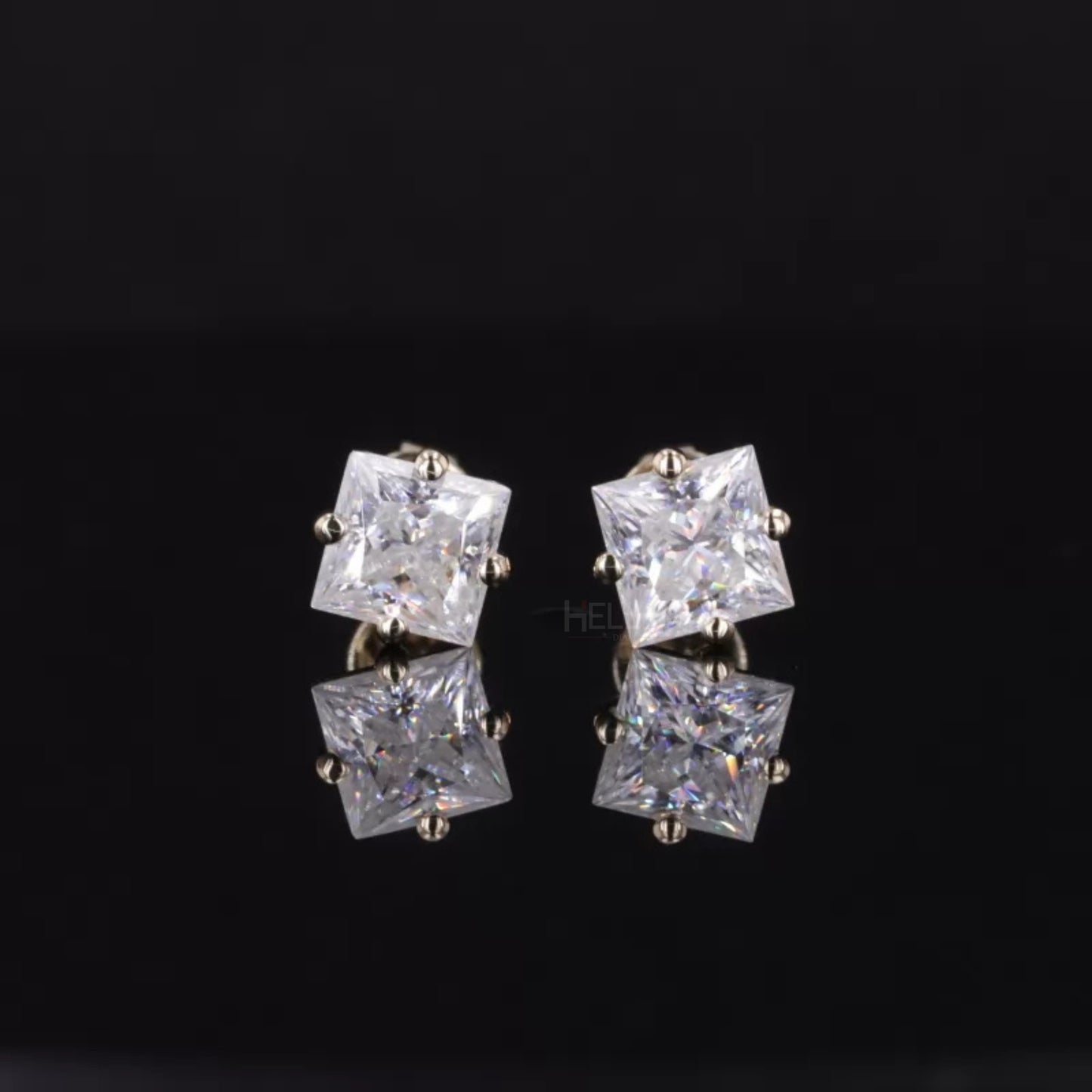 Princess cut moissanite studs with a unique setting – modern sparkle with a bold edge