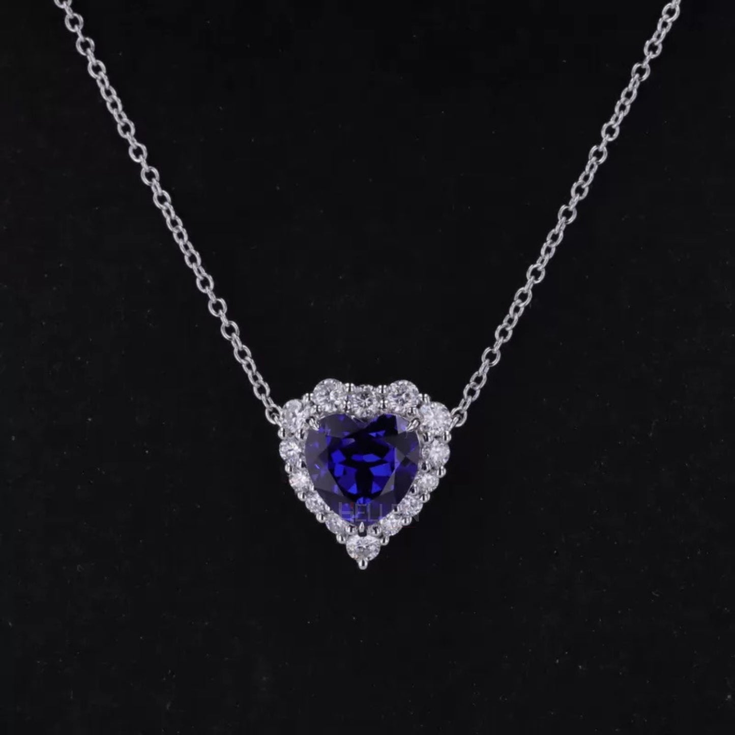 Heart shaped blue sapphire gemstone pendant with halo moissanite – romantic and regal necklace design