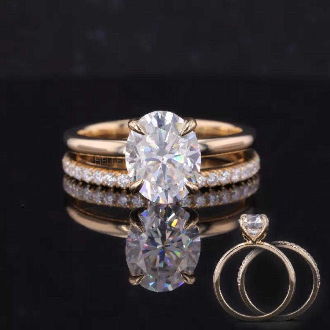 Oval solitaire ring paired with a half-round eternity band – elegant bridal stack set with timeless design