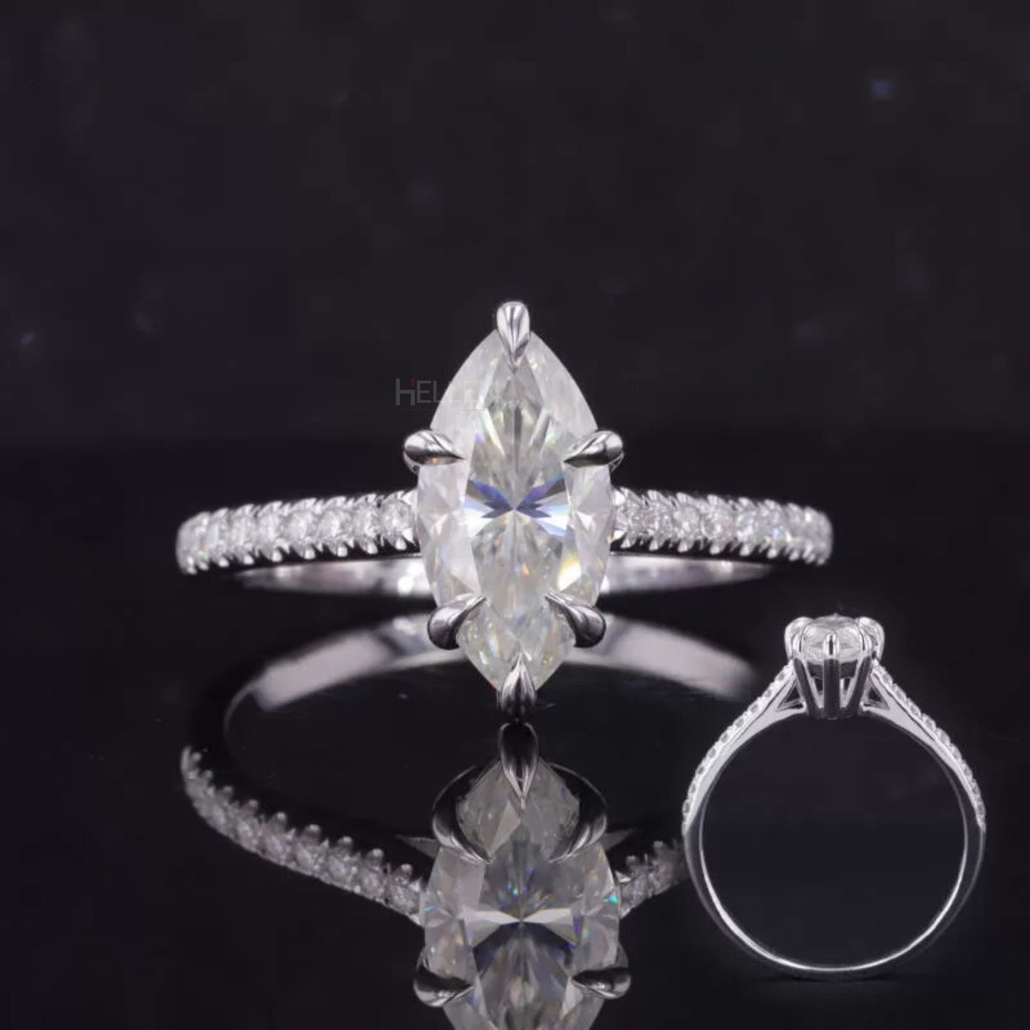 Marquise cut moissanite solitaire ring with claw prongs and pavé diamond band – sleek, eye-catching engagement ring