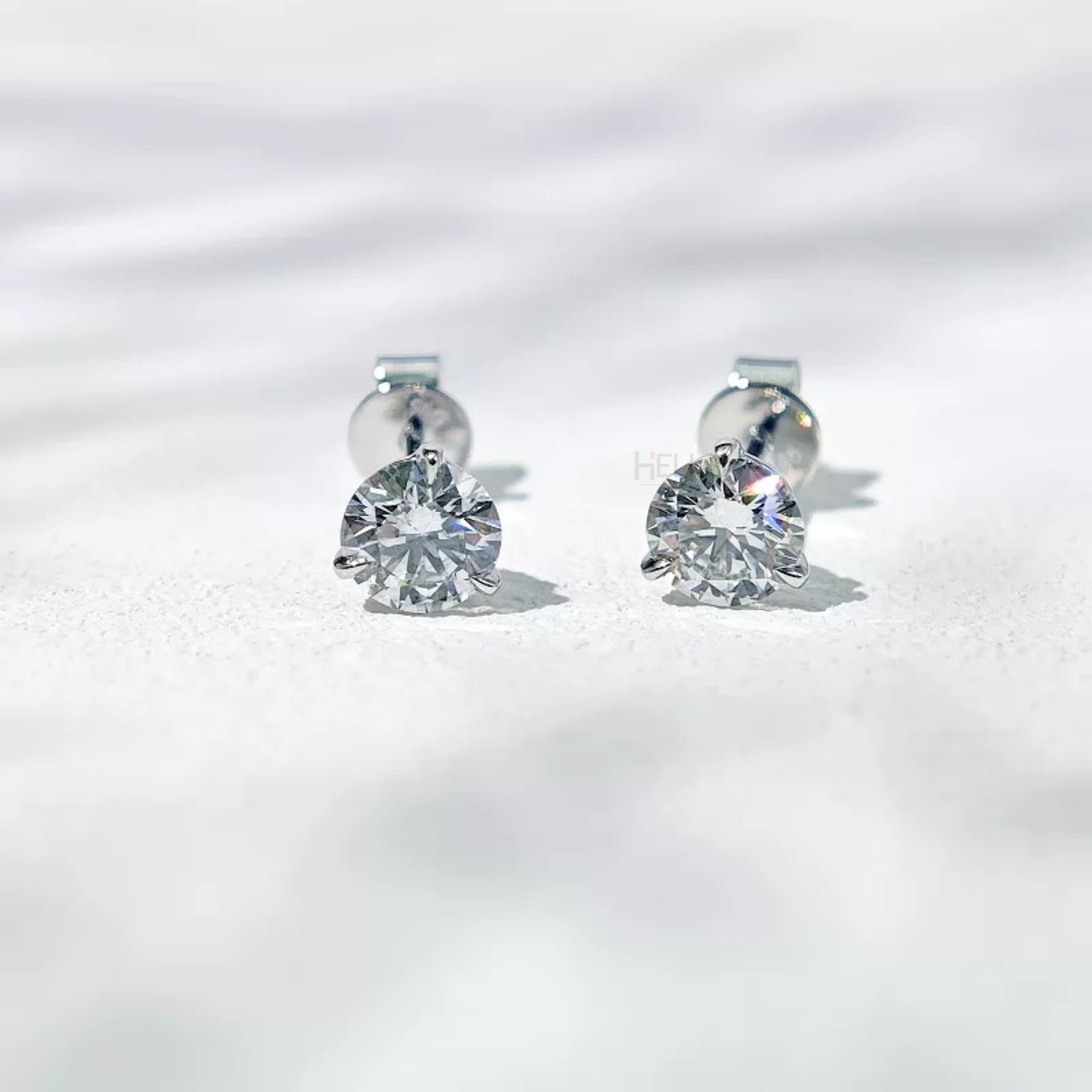 Round cut solitaire Moissanite sterling silver studs