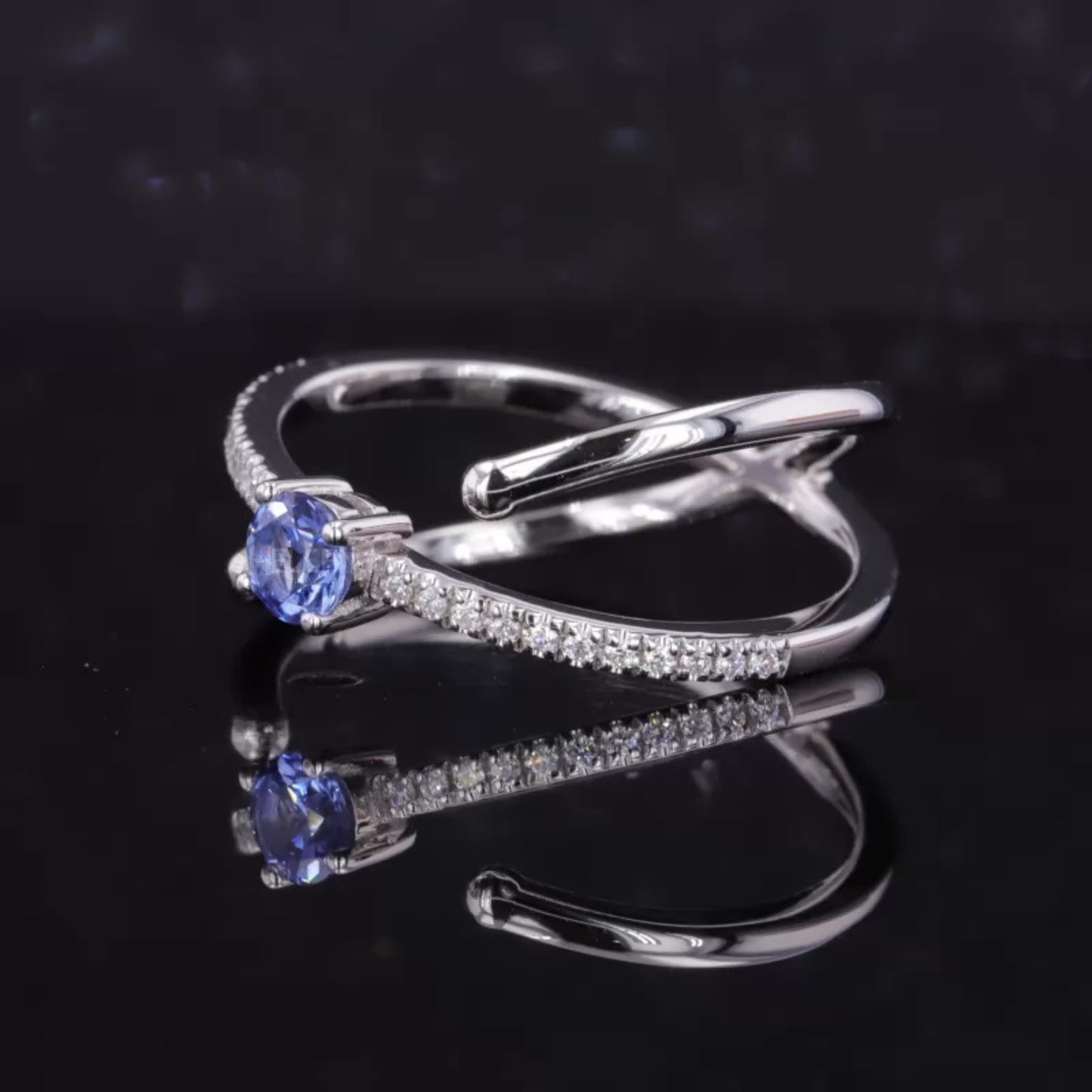 Blue Sapphire Round Cut Gemstone & Round Side Stone Crossover Ring