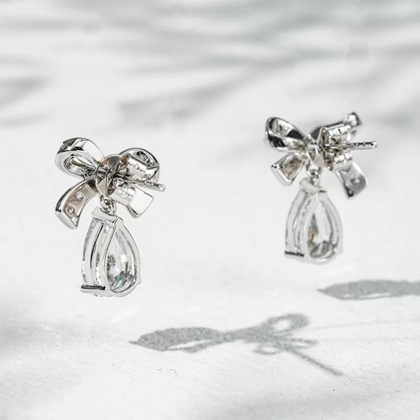 Pear Cut Moissanite Drop Earrings Elegant Bow Knot in Sterling Silver