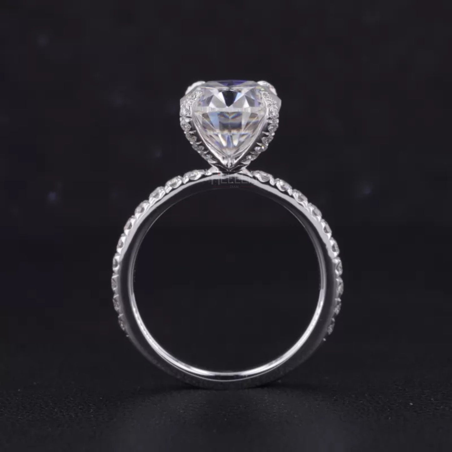 Oval Cut Moissanite Solitaire with Diamonds on Tiger Prongs Ring