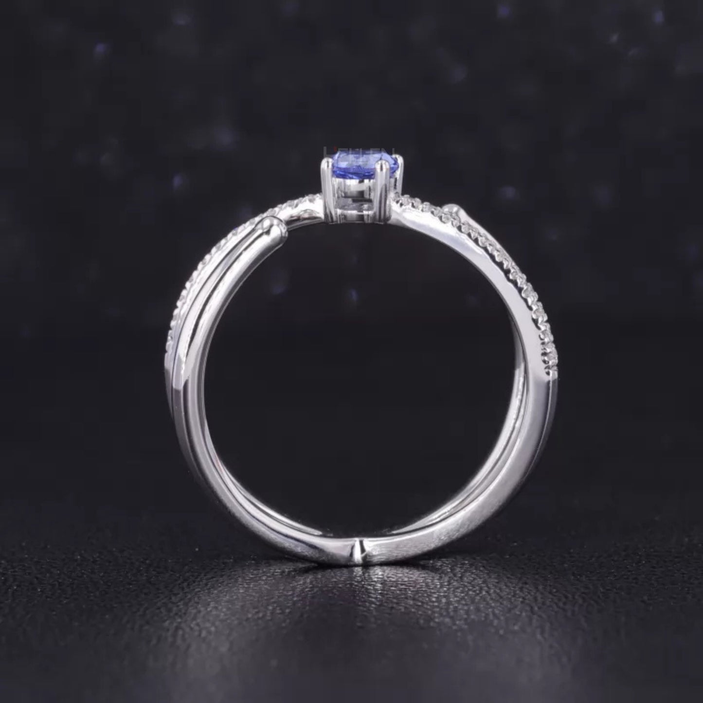 Blue Sapphire Round Cut Gemstone & Round Side Stone Crossover Ring
