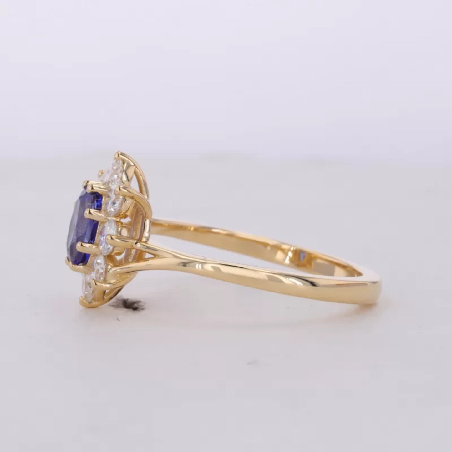 Blue Sapphire Oval Gemstone with Round Cut Halo Engagement Ring