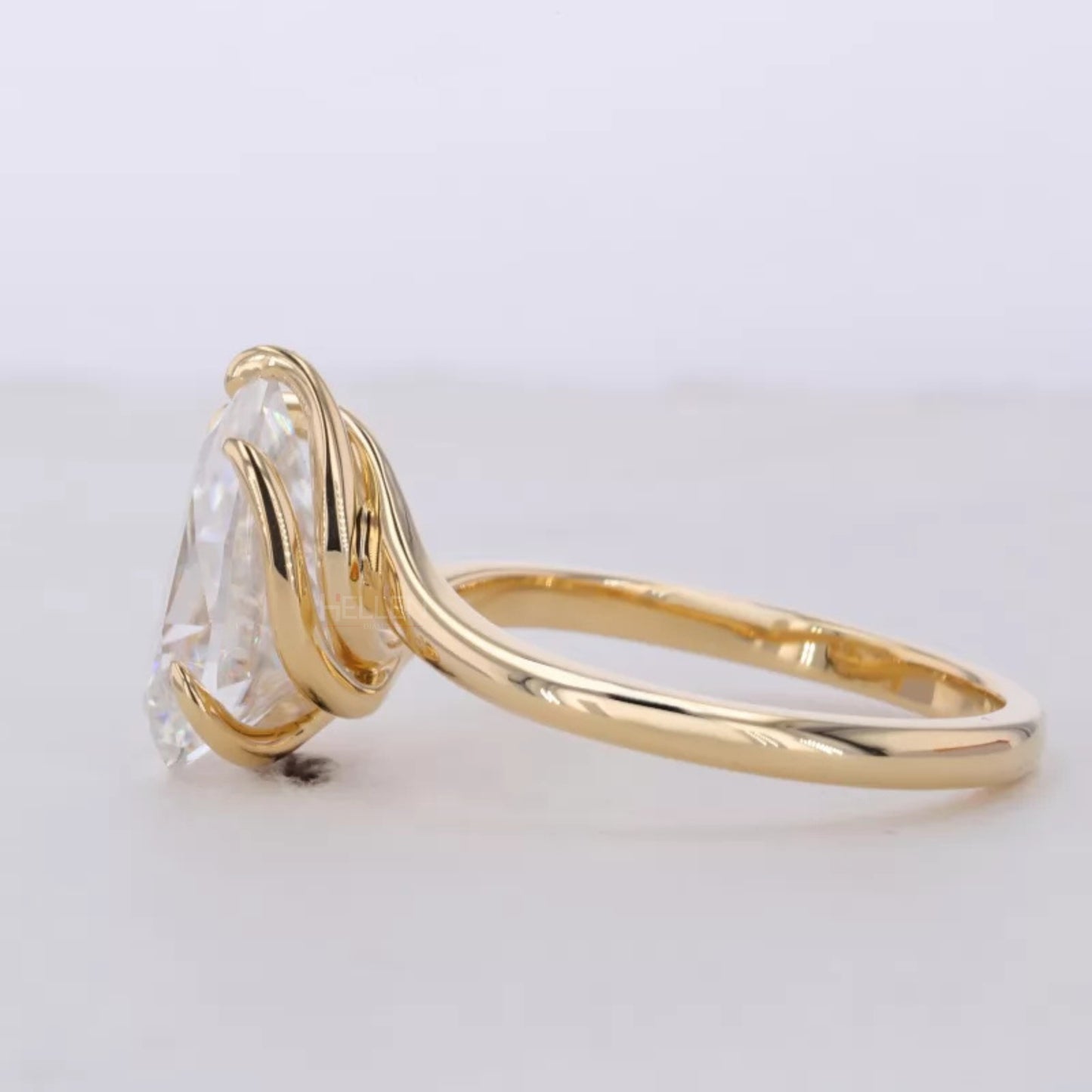 Unique 5 Prong Spiral Pear Cut Solitaire Proposal Ring