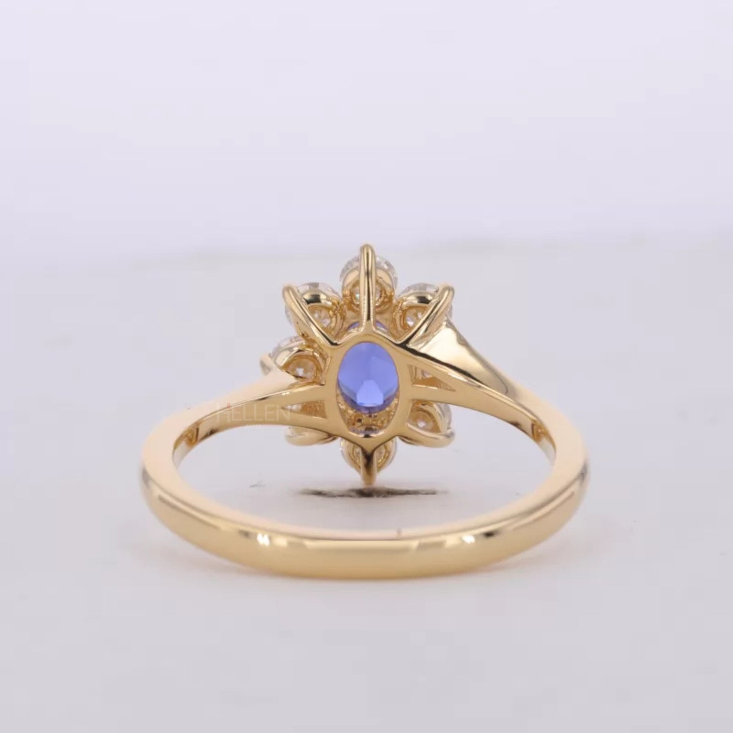 Blue Sapphire Oval Gemstone with Round Cut Halo Engagement Ring