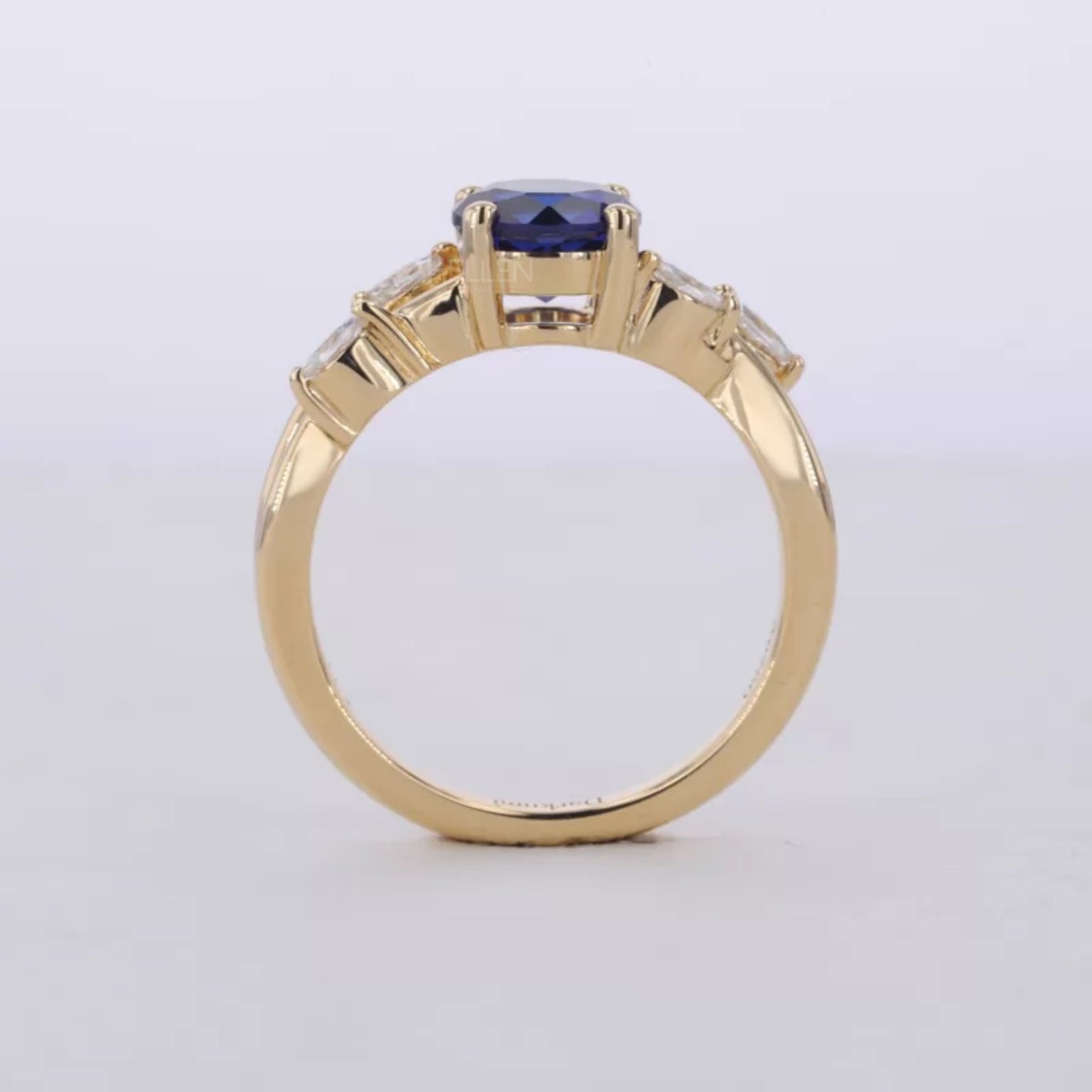 Blue Sapphire Round Cut Gemstone & Marquise Side Stone Ring