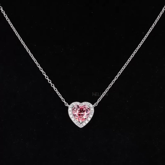 Heart-shaped pink gemstone pendant with moissanite halo – romantic necklace in vibrant feminine tones

