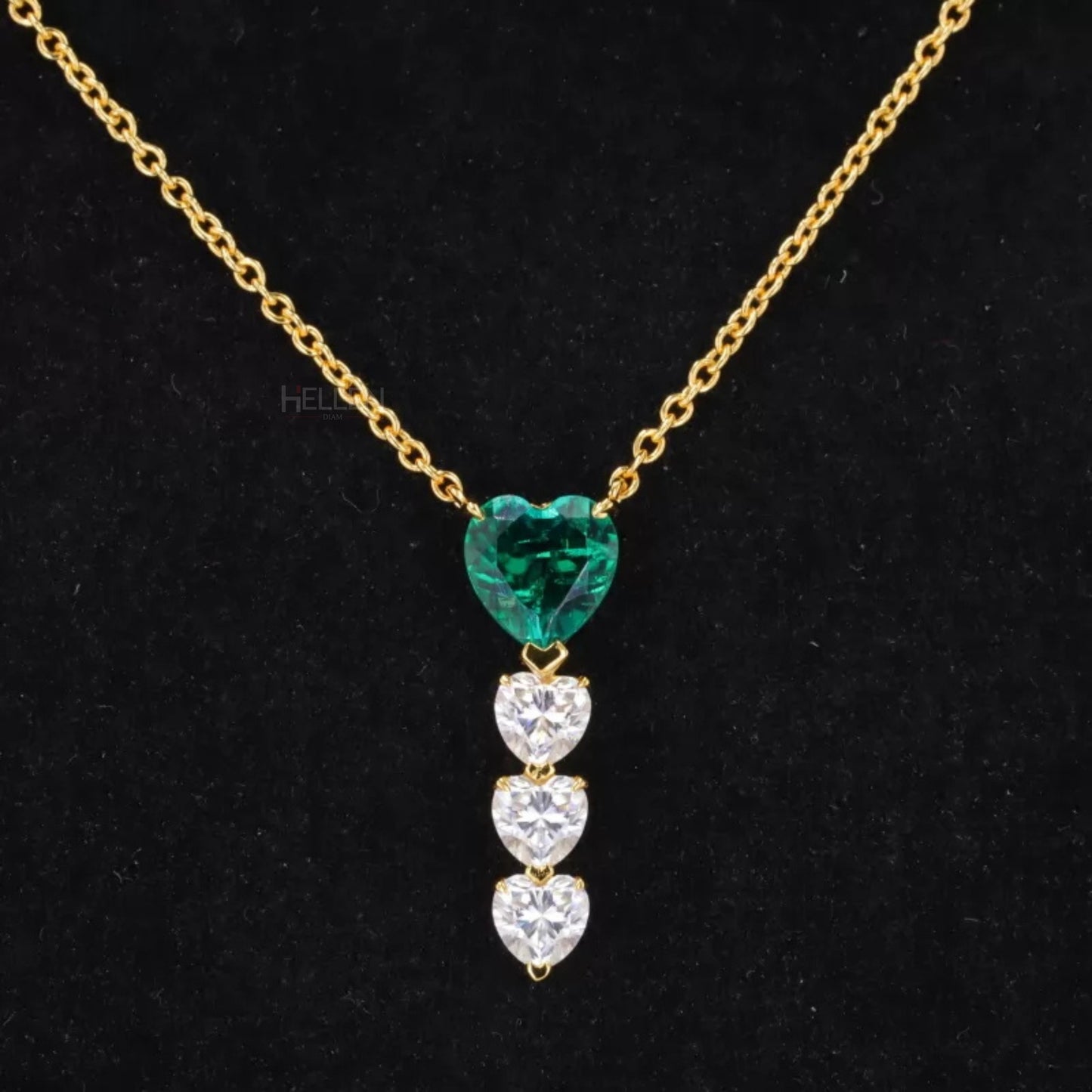 Long necklace featuring green gemstones and moissanite – vibrant, layered design for bold styling