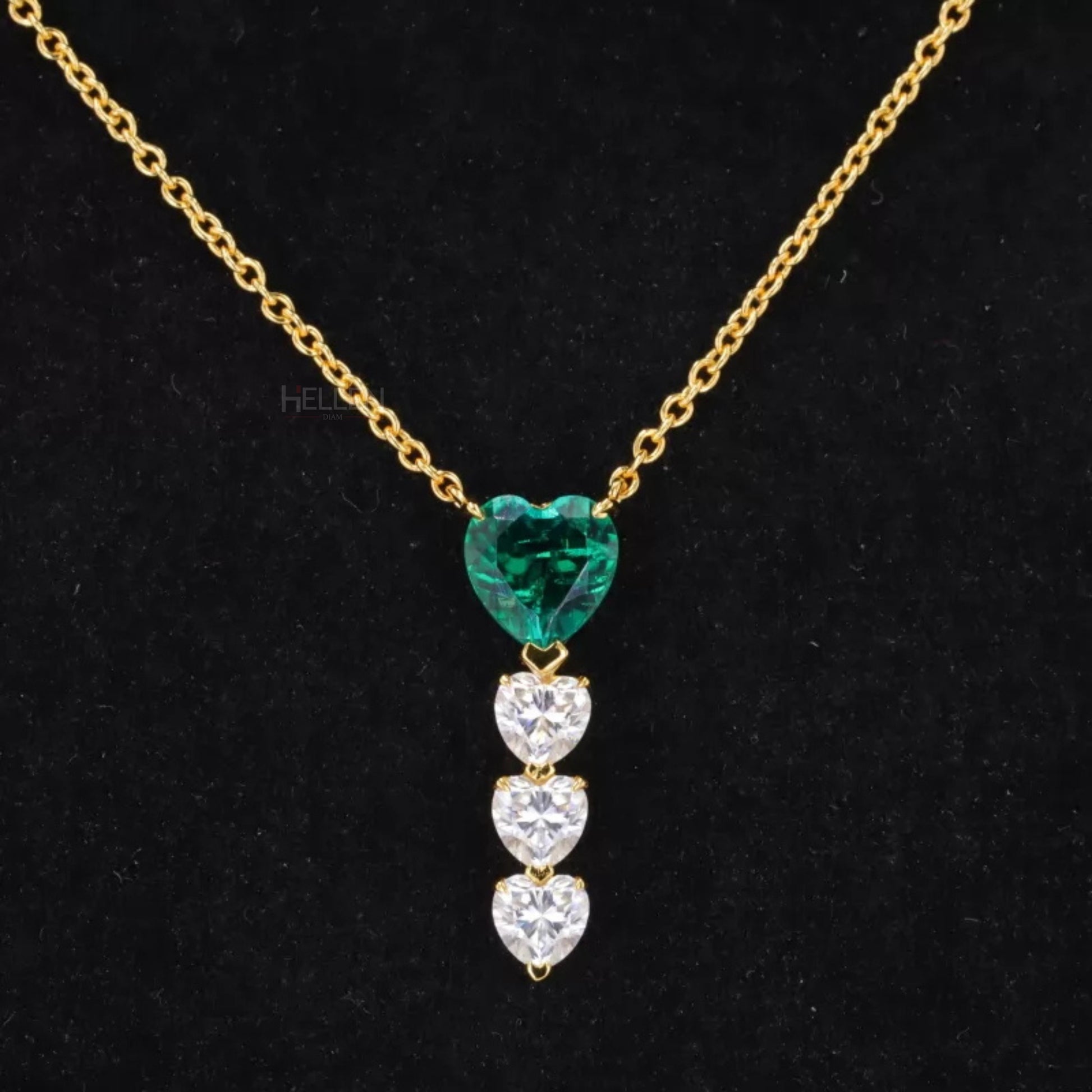 Long necklace featuring green gemstones and moissanite – vibrant, layered design for bold styling