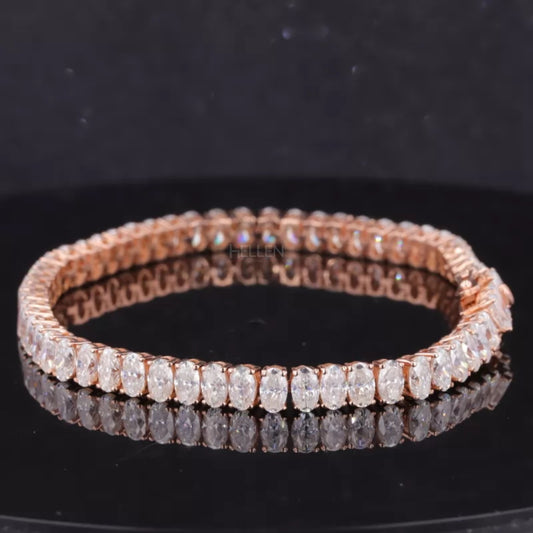 Classic tennis bracelet featuring oval cut moissanite in 4 prong setting – timeless and sparkling accessory