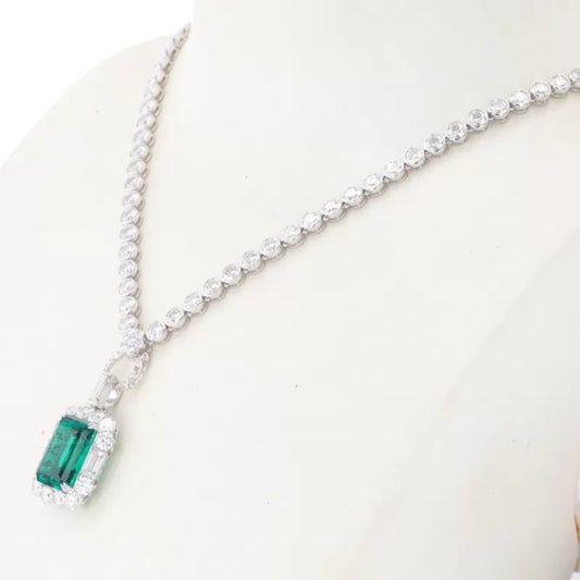 Emerald gemstone and round moissanite necklace with bezel chain – elegant and refined layered lo