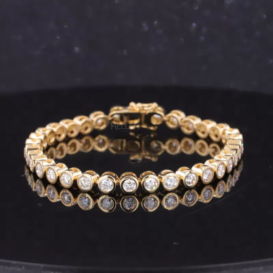 Elegant tennis bracelet with bezel set round cut moissanite – secure and sophisticated jewelry design
