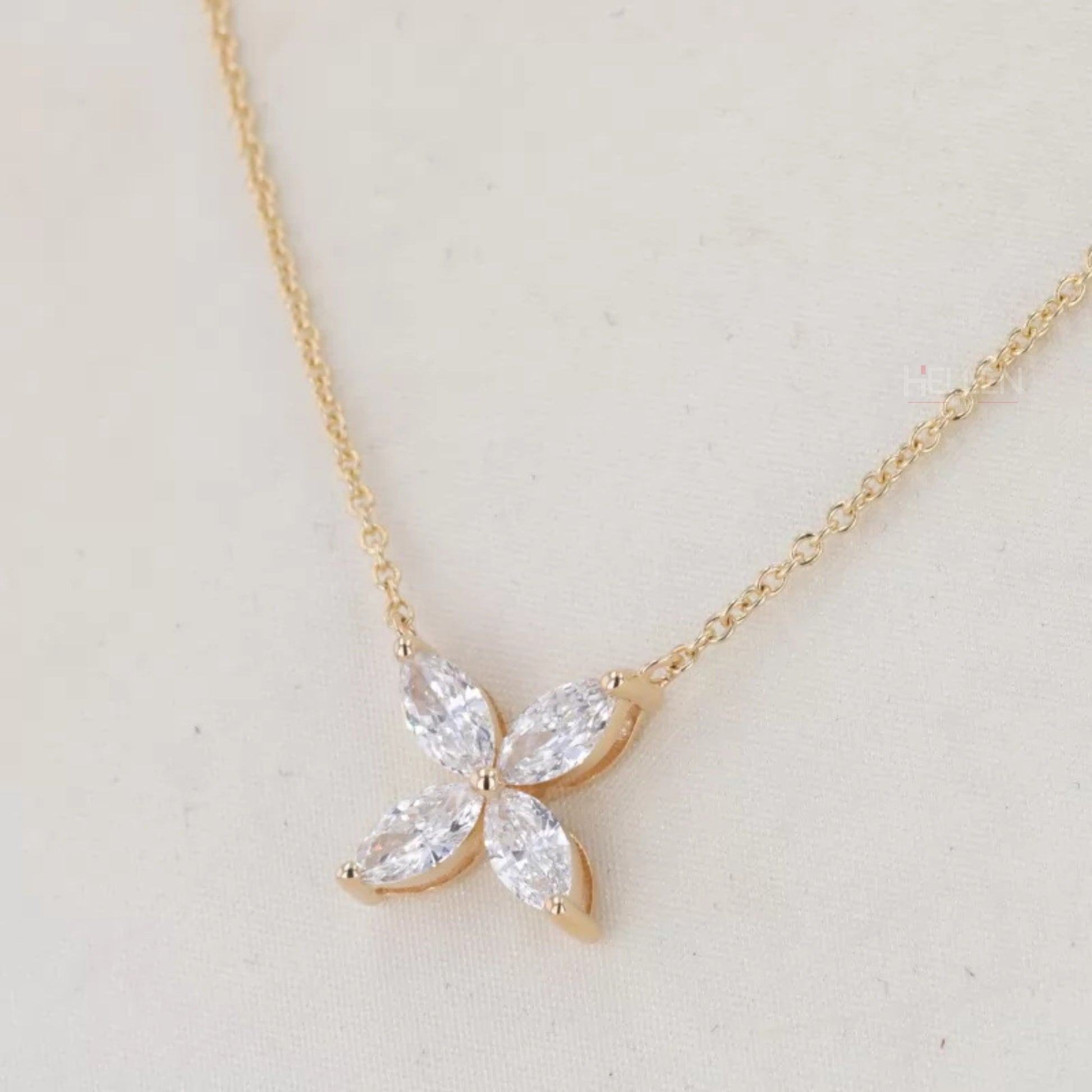 Everyday necklace with marquise cut moissanite in a 4-petal floral design – feminine and nature-inspired pendant

