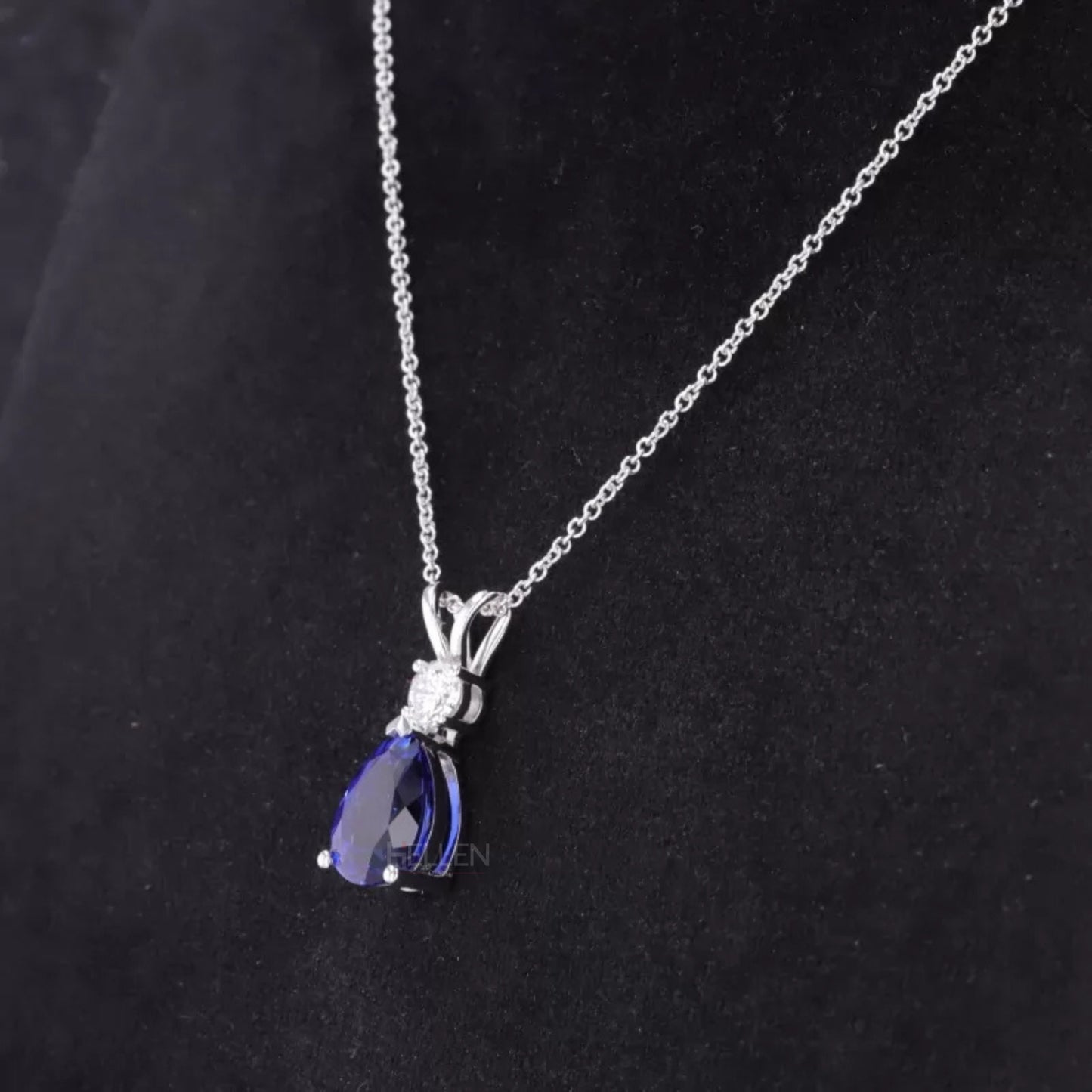 Pear Cut Blue Tanzanite Drop Necklace With Round Moissanite
