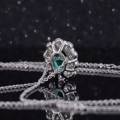 Iconic Oval Emerald Halo Necklace with Round Moissanite