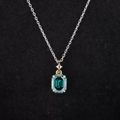 Emerald gemstone cross necklace with octagon cut center – spiritual and elegant gift piece with vibrant green stone