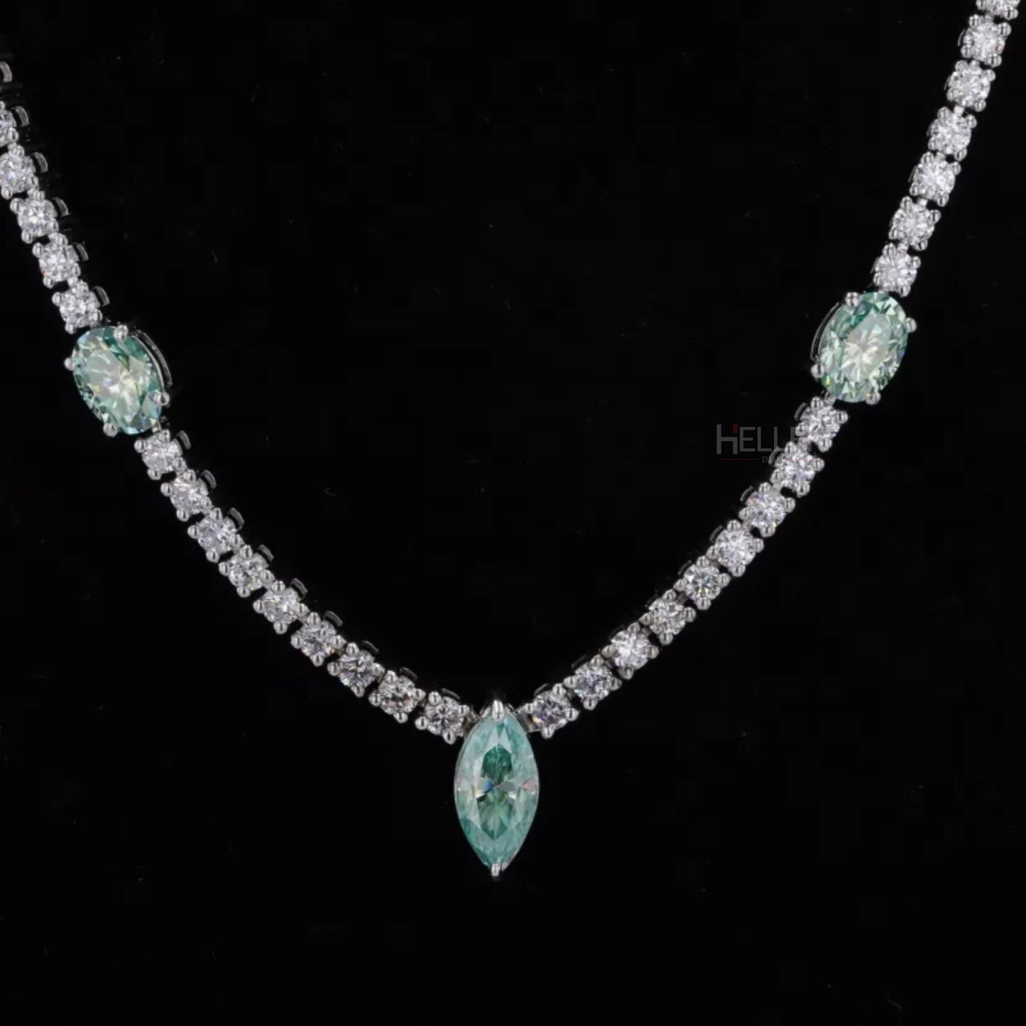 Tennis necklace featuring oval, marquise, and round cut blue-green moissanite – vibrant and dynamic statement piece

