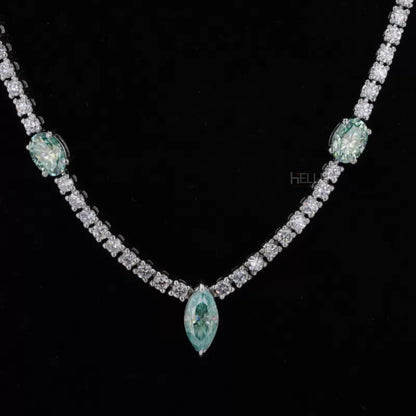 Tennis necklace featuring oval, marquise, and round cut blue-green moissanite – vibrant and dynamic statement piece

