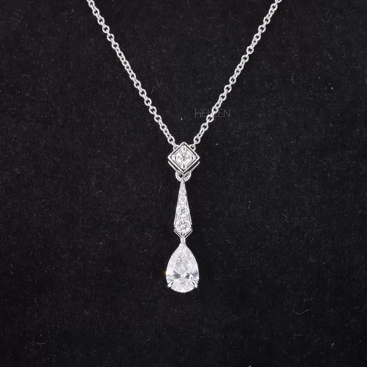 Long drop necklace with pear and round cut moissanite – graceful water-inspired design for layered wear

