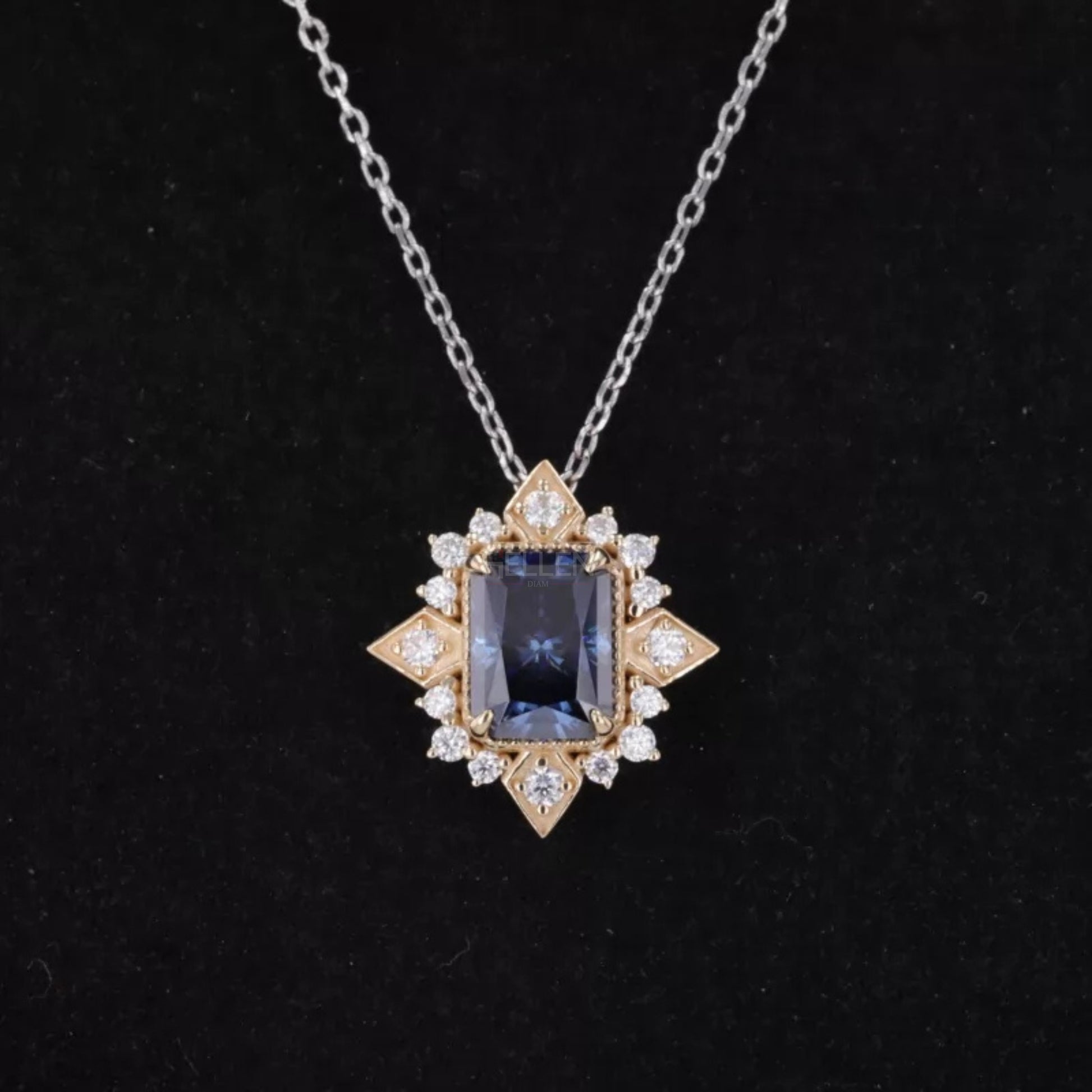 Spirit flower necklace featuring radiant cut blue sapphire gemstone – artistic and symbolic pendant design