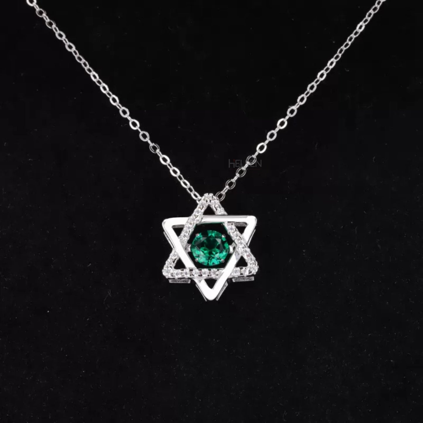 Star-shaped necklace with green emerald and moissanite accents – celestial charm with colorful brilliance


