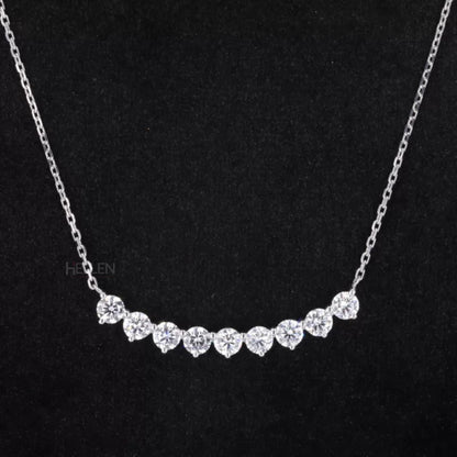 Broad smiley face necklace with round cut moissanite – playful and sparkling everyday accessory