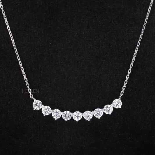 Broad smiley face necklace with round cut moissanite – playful and sparkling everyday accessory