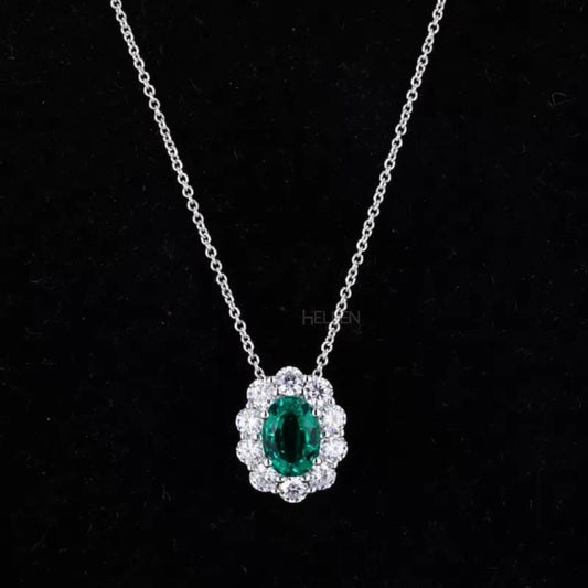 Oval emerald necklace with round moissanite halo – iconic elegance with vivid green center

