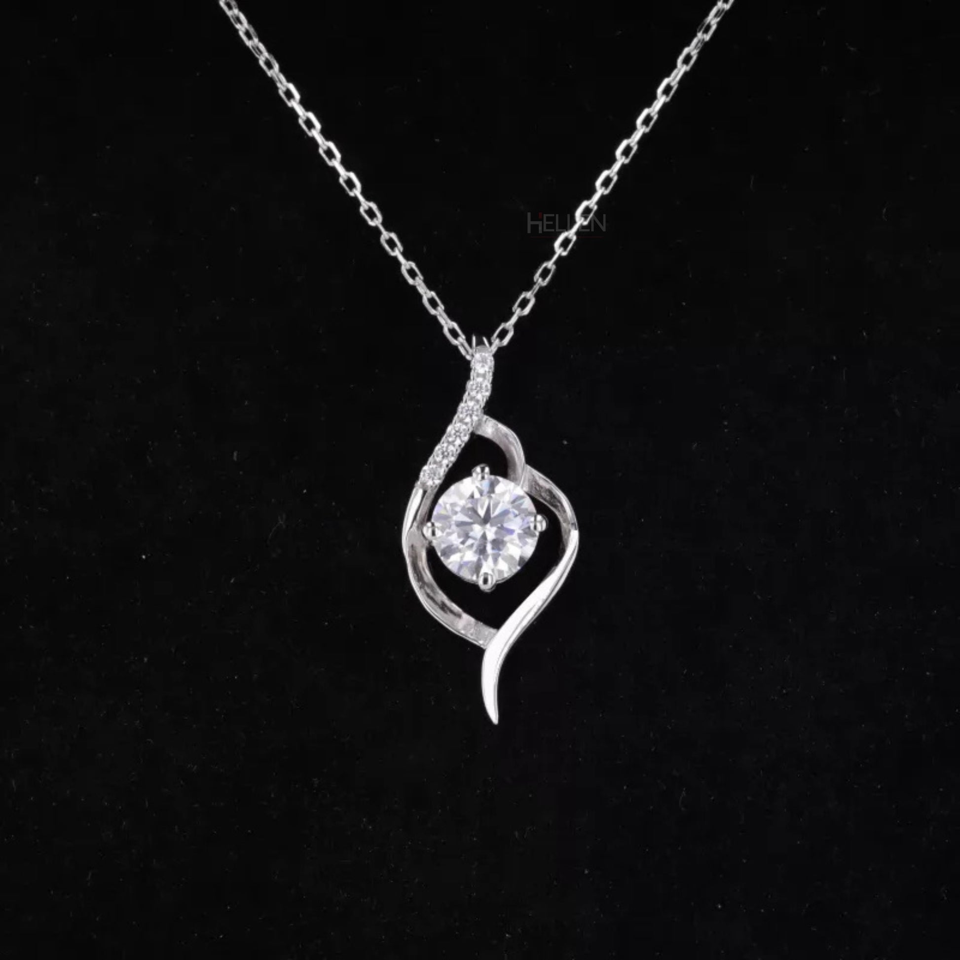 Leaf-inspired pendant necklace with round cut moissanite solitaire – nature-themed design for elegant wear