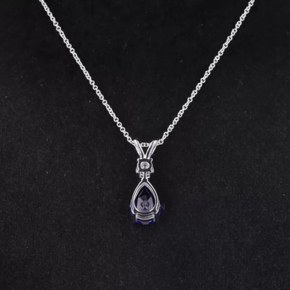 Pear Cut Blue Tanzanite Drop Necklace With Round Moissanite