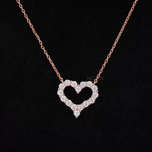 Heart-shaped pendant with dual loops and round cut moissanite – romantic and meaningful jewelry design


