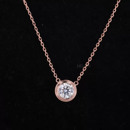 Round cut moissanite solitaire necklace with bezel setting and dual loops – secure and elegant everyday pendant