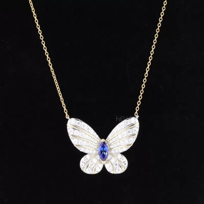 Butterfly necklace with marquise and round moissanite and blue sapphires – vibrant and whimsical sparkle

