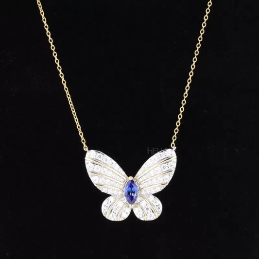 Butterfly necklace with marquise and round moissanite and blue sapphires – vibrant and whimsical sparkle

