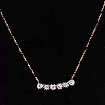 Smiley necklace with five round cut moissanite stones in bezel setting – cheerful sparkle for everyday style

