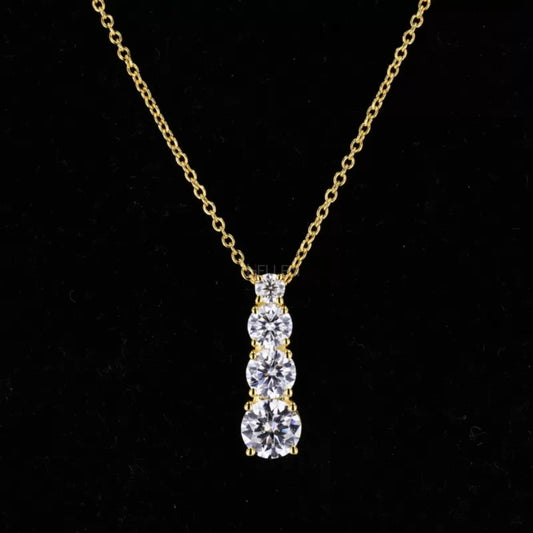 Long pendant necklace with small round cut moissanite in ascending line – elegant and minimalist vertical design