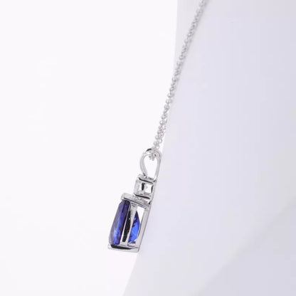 Pear Cut Blue Tanzanite Drop Necklace With Round Moissanite