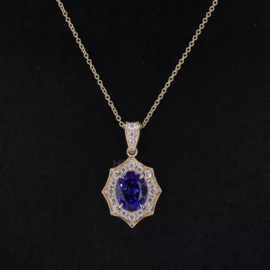 Vintage-style necklace featuring blue oval sapphire and moissanite accents – classic gemstone pendant for special occasions
