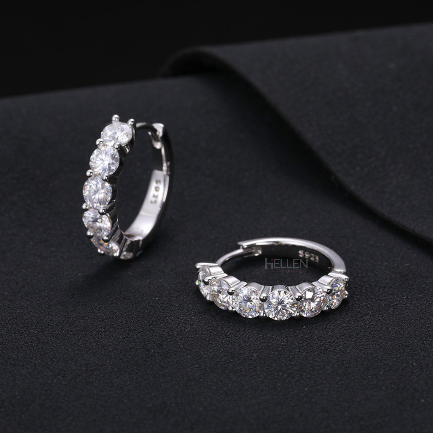 Huggie hoop earrings featuring round cut moissanite – sleek and secure style with radiant shine

