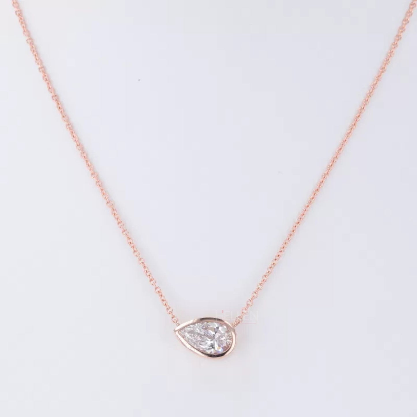 East To West Pear Cut Moissanite Solitaire Bezel Setting Necklace