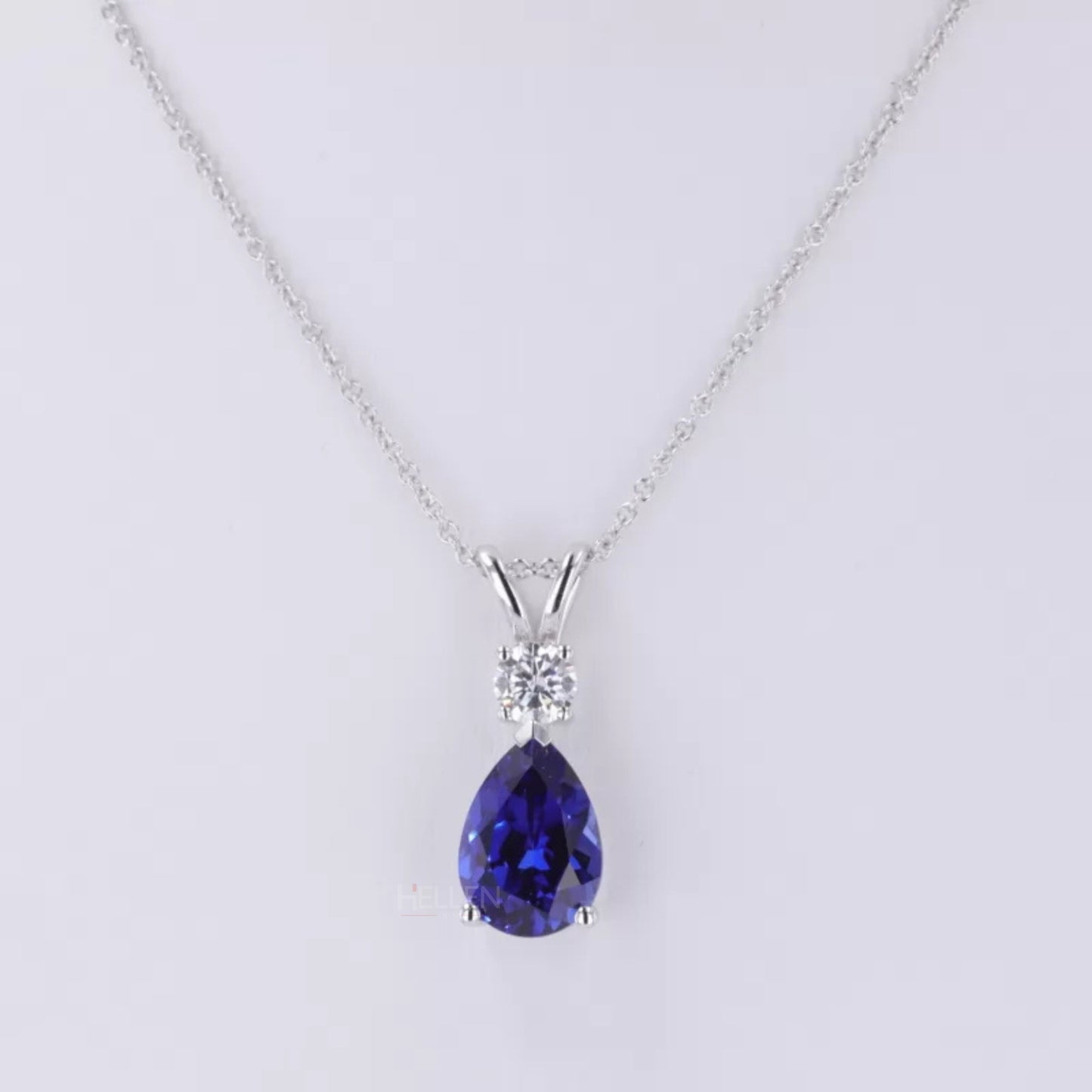 Pear Cut Blue Tanzanite Drop Necklace With Round Moissanite