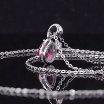 Pink Pear Cut Red Ruby Halo Necklace With Colorless Moissanite